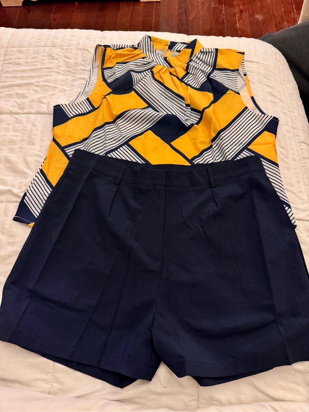 Sleeveless Blouse in Yellow and Navy Geometric Print Navy Shorts Set